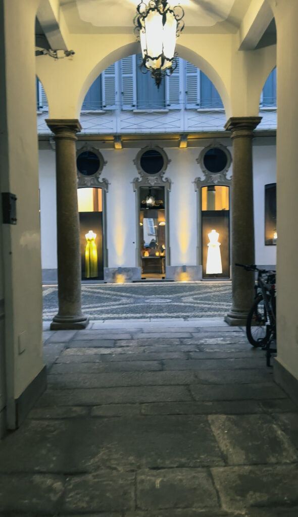 Storefront of Giambattista Valli Paris Milan with dresses in window
